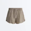 Technische 2-in-1-Shorts mit Karomuster und mittlerer Leibhöhe Technische 2-in-1-Shorts mit Karomuster und mittlerer Leibhöhe