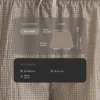Technische 2-in-1-Shorts mit Karomuster und mittlerer Leibhöhe Technische 2-in-1-Shorts mit Karomuster und mittlerer Leibhöhe