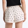 Technische Shorts mit Polka-Dot-Muster Technische Shorts mit Polka-Dot-Muster