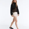 Technische Shorts mit Polka-Dot-Muster Technische Shorts mit Polka-Dot-Muster