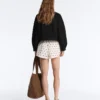 Technische Shorts mit Polka-Dot-Muster Technische Shorts mit Polka-Dot-Muster