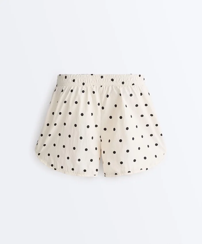 Technische Shorts mit Polka-Dot-Muster Technische Shorts mit Polka-Dot-Muster