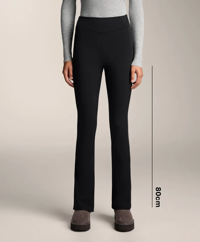 Warme Flare-Hose mit hoher Leibhöhe und Taschen Warme Flare-Hose mit hoher Leibhöhe und Taschen