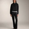 Warme Flare-Hose mit hoher Leibhöhe und Taschen Warme Flare-Hose mit hoher Leibhöhe und Taschen