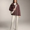 Warme Flare-Hose mit hoher Leibhöhe und Taschen Warme Flare-Hose mit hoher Leibhöhe und Taschen