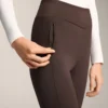 Warme, hoch geschnittene, knöchellange Leggings mit Taschen, 70 cm Warme, hoch geschnittene, knöchellange Leggings mit Taschen, 70 cm