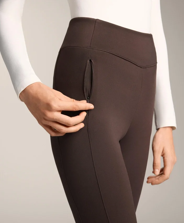 Warme, hoch geschnittene, knöchellange Leggings mit Taschen, 70 cm Warme, hoch geschnittene, knöchellange Leggings mit Taschen, 70 cm