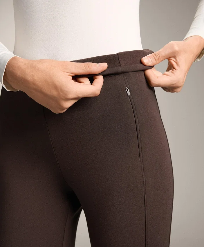Warme, hoch geschnittene, knöchellange Leggings mit Taschen, 70 cm Warme, hoch geschnittene, knöchellange Leggings mit Taschen, 70 cm