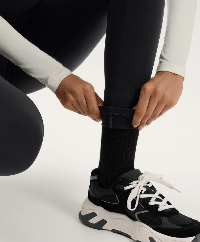 Warme, hoch geschnittene, knöchellange Leggings mit Taschen, 70 cm Warme, hoch geschnittene, knöchellange Leggings mit Taschen, 70 cm