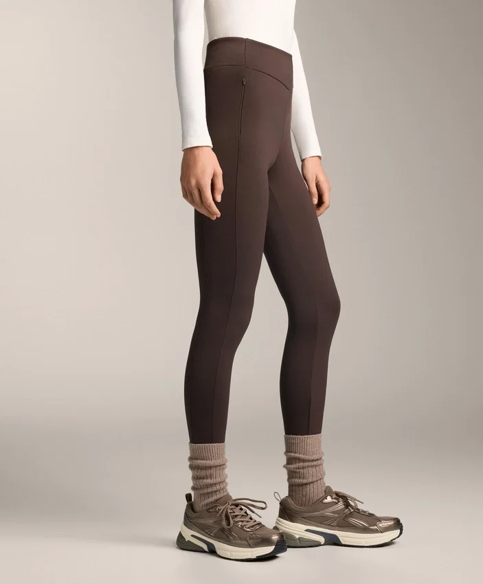 Warme, hoch geschnittene, knöchellange Leggings mit Taschen, 70 cm Warme, hoch geschnittene, knöchellange Leggings mit Taschen, 70 cm