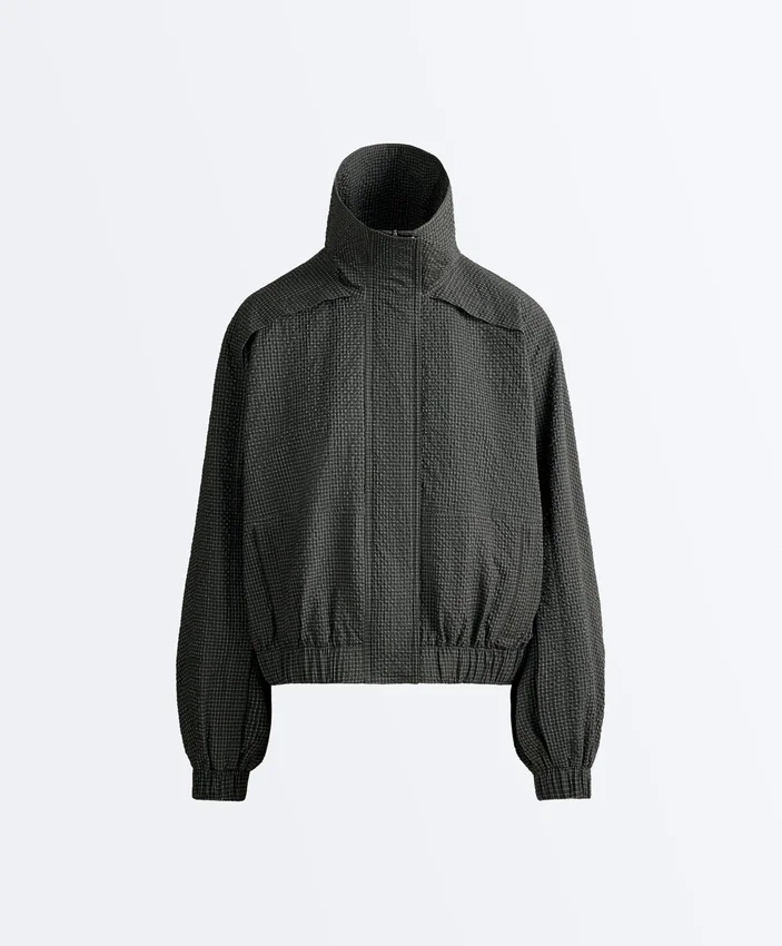 Wasserabweisende Nylon-Jacke im Karomuster Wasserabweisende Nylon-Jacke im Karomuster