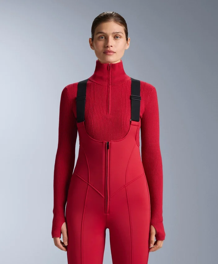 Wasserabweisende Ski-Latzhose mit ausgestelltem Bein Wasserabweisende Ski-Latzhose mit ausgestelltem Bein