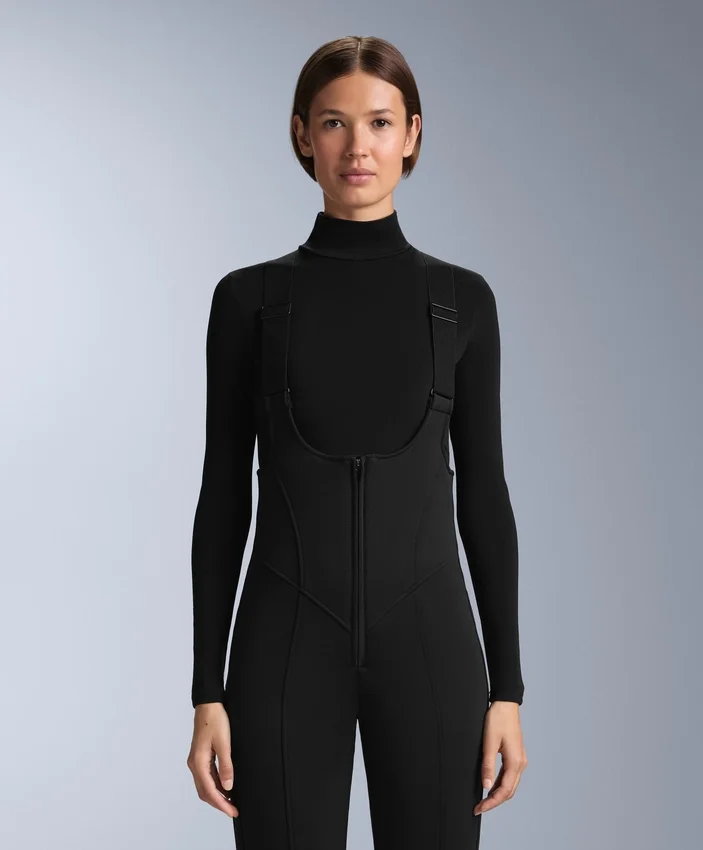 Wasserabweisende Ski-Latzhose mit ausgestelltem Bein Wasserabweisende Ski-Latzhose mit ausgestelltem Bein
