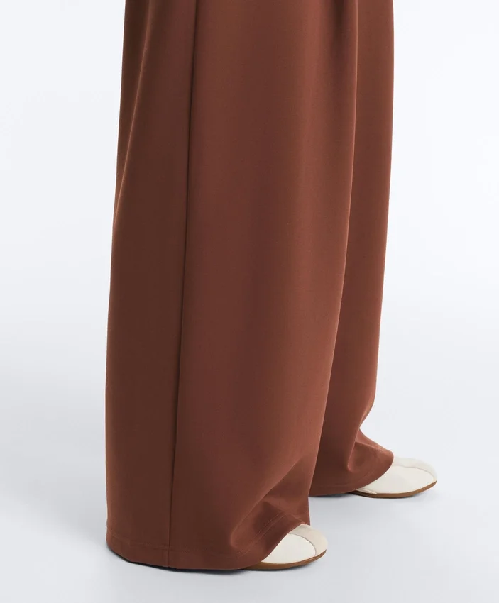 Weit geschnittene Hose mit hoher Leibhöhe aus Baumwollpiqué Weit geschnittene Hose mit hoher Leibhöhe aus Baumwollpiqué