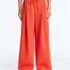 Weit geschnittene Piqué-Baumwoll-Hose mit Falten Weit geschnittene Piqué-Baumwoll-Hose mit Falten